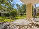 Outdoor patio area with seating for six, perfect for entertaining at 7502 Seven Eagles Way, Reunion, FL 34747