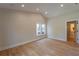 Bright bedroom with hardwood floors and an ensuite bathroom at 17 N Shine Ave, Orlando, FL 32801