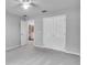 Bedroom with ensuite bathroom and double-door closet at 1042 Twisted Branch Ln, St Cloud, FL 34771