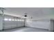 Garage with automatic door opener and extra space at 1042 Twisted Branch Ln, St Cloud, FL 34771