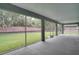 Spacious screened porch overlooking backyard at 1042 Twisted Branch Ln, St Cloud, FL 34771