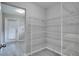 Walk-in pantry with ample shelving for storage at 1042 Twisted Branch Ln, St Cloud, FL 34771