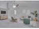 Spacious living room with vaulted ceilings and neutral decor at 1042 Twisted Branch Ln, St Cloud, FL 34771