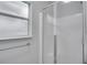 Bathroom with shower and window at 1042 Twisted Branch Ln, St Cloud, FL 34771
