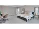Elegant Primary bedroom with plush carpeting, a comfortable sitting area, and neutral decor at 1042 Twisted Branch Ln, St Cloud, FL 34771
