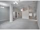 Spacious living room with high ceilings, ceiling fan and an open floor plan at 1042 Twisted Branch Ln, St Cloud, FL 34771