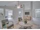 Open living area with views into kitchen and entryway at 1042 Twisted Branch Ln, St Cloud, FL 34771