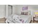 Cozy bedroom with Hello Kitty bedding and closet at 3663 Circle Hook St, Kissimmee, FL 34746