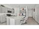 Modern kitchen with gray cabinets and island at 3663 Circle Hook St, Kissimmee, FL 34746