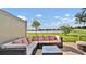 Peaceful patio with lake view and seating at 3663 Circle Hook St, Kissimmee, FL 34746