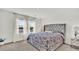 Spacious bedroom with large windows and lake view at 3663 Circle Hook St, Kissimmee, FL 34746