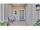 Inviting entryway with bench and front door at 3663 Circle Hook St, Kissimmee, FL 34746