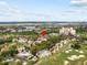 Aerial view of resort community highlighting specific location at 7502 Seven Eagles Way, Reunion, FL 34747