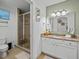 Bathroom with granite vanity and garden tub at 7502 Seven Eagles Way, Reunion, FL 34747