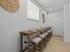 Long breakfast bar with seating for six in a condo at 7502 Seven Eagles Way, Reunion, FL 34747