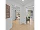 Hallway with views into other rooms and tile floors at 7502 Seven Eagles Way, Reunion, FL 34747