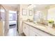 Double vanity bathroom with granite countertop at 1548 Moon Valley Dr, Davenport, FL 33896