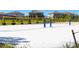 Enjoy a sunny day playing volleyball on this community court at 1548 Moon Valley Dr, Davenport, FL 33896