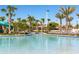Resort-style pool with a lazy river and waterslide at 1548 Moon Valley Dr, Davenport, FL 33896