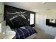 Star Wars themed bedroom with a full-size bed and TV at 1548 Moon Valley Dr, Davenport, FL 33896