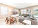 Spacious living room with sectional sofa and large TV at 1548 Moon Valley Dr, Davenport, FL 33896