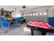 Game room with pool table, basketball game, and foosball at 1548 Moon Valley Dr, Davenport, FL 33896
