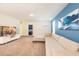 Gathering room with sectional sofa and large TV at 1548 Moon Valley Dr, Davenport, FL 33896