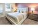Bedroom with king-size bed and nightstands at 1548 Moon Valley Dr, Davenport, FL 33896