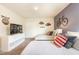 Bedroom with two twin beds, dresser and TV at 1548 Moon Valley Dr, Davenport, FL 33896