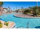 Resort-style pool with a lazy river and lounge chairs at 1548 Moon Valley Dr, Davenport, FL 33896