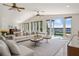 Living room with lake view and ample seating at 325 Magnolia St, Windermere, FL 34786