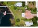Waterfront property with pool and boathouse at 325 Magnolia St, Windermere, FL 34786