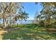 Spacious backyard with lake view and private dock at 10611 Jim Edwards Rd, Haines City, FL 33844