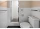 Clean bathroom with shower stall, toilet and tiled walls at 10611 Jim Edwards Rd, Haines City, FL 33844