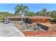 Ranch style home with stone exterior and landscaping at 10611 Jim Edwards Rd, Haines City, FL 33844