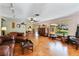 Bright living room featuring hardwood floors and access to the backyard at 10611 Jim Edwards Rd, Haines City, FL 33844