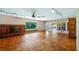 Living room with hardwood floors and sliding glass doors leading to the outdoors at 10611 Jim Edwards Rd, Haines City, FL 33844