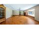 Living room with parquet flooring and ample natural light at 10611 Jim Edwards Rd, Haines City, FL 33844