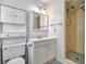 Bathroom with vanity, toilet, shower, and storage at 7685 Ceres Dr, Orlando, FL 32822