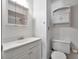 Clean bathroom with vanity, toilet and shower at 7685 Ceres Dr, Orlando, FL 32822