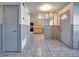Entryway with view into kitchen and tile floor at 7685 Ceres Dr, Orlando, FL 32822