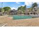 Resort-style community pool with surrounding lounge chairs at 7524 Seurat St # 12301, Orlando, FL 32819