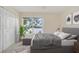 Spacious bedroom with lake view and stylish decor at 7524 Seurat St # 12301, Orlando, FL 32819