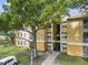 Exterior view of the building, showcasing its architecture at 7524 Seurat St # 12301, Orlando, FL 32819