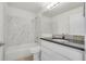 Clean bathroom with updated vanity and bathtub at 7524 Seurat St # 12301, Orlando, FL 32819
