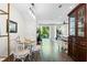 Bright dining area with white table and chairs, near sliding doors at 570 Pinebranch Cir, Winter Springs, FL 32708