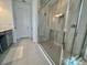 Large walk-in shower with modern tile at 16744 Sanctuary Dr, Winter Garden, FL 34787