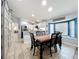 Dining room with a wooden table and seating for six at 13333 Early Frost Cir, Orlando, FL 32828