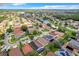 Wide neighborhood view, showcasing various homes and landscaping at 13333 Early Frost Cir, Orlando, FL 32828