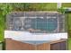 An aerial view showcasing a lovely, screened-in pool and patio area at 13333 Early Frost Cir, Orlando, FL 32828